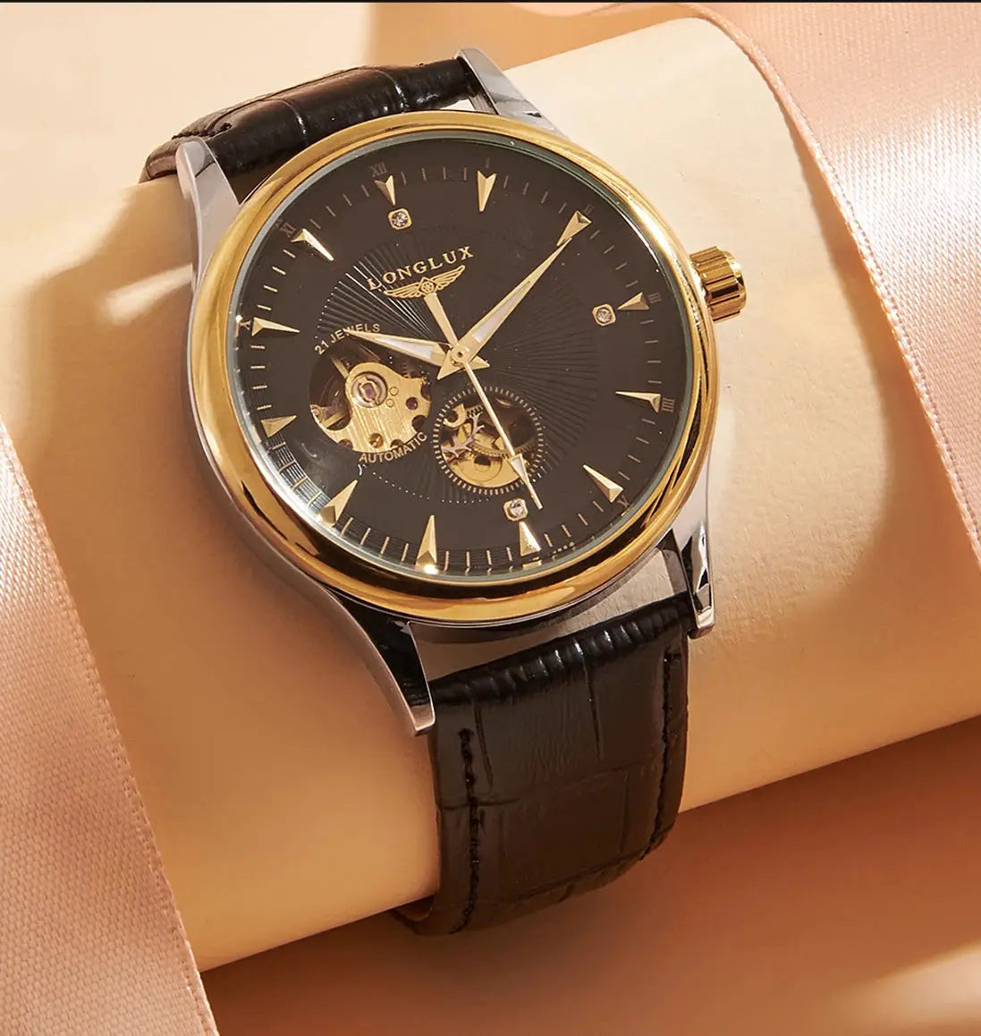 LONGLUX automatic skeleton wristwatch with black dial, gold-tone bezel, and leather strap