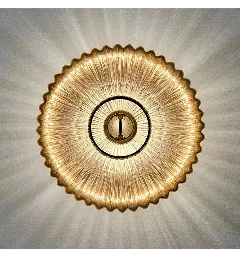 Nordic LED glass wall sconce in gold with circular sunburst shade by Simples Market
