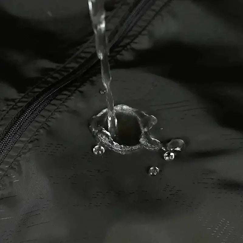 LNGXO black waterproof hiking jacket with zipper, water beading on durable fabric