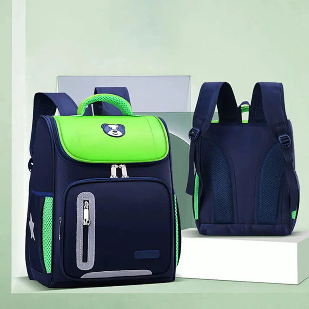 Simples Market children's school backpack in navy with neon green top flap and accents, front zip pocket.