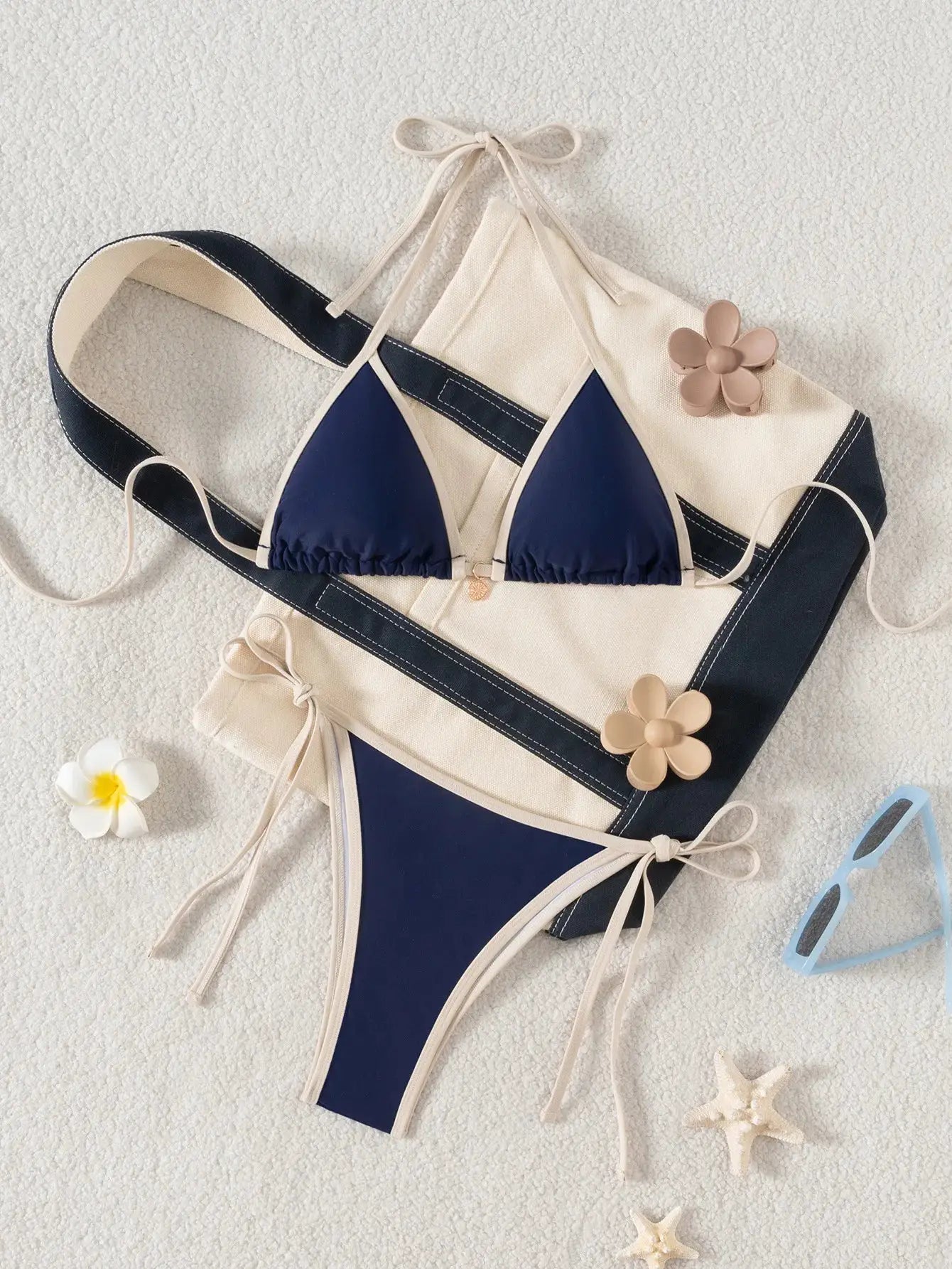 Simples Market two-piece bikini set in navy and beige with color-block edges and tie sides