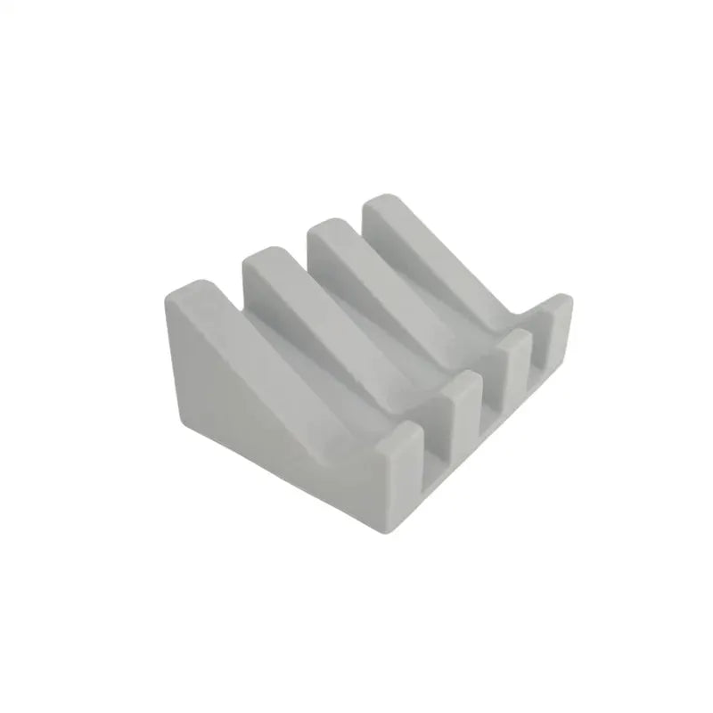 Simples Market silicone soap dish rack with tilt drain in white.