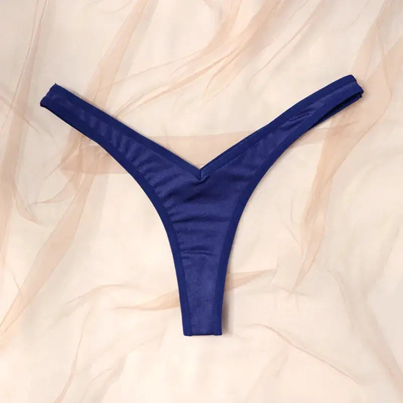 Blue thong underwear for women by Simples Market, low-waist style.