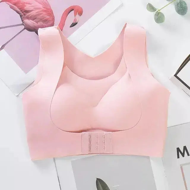 Posture correction bra in pink, seamless with wide straps and back hook closure