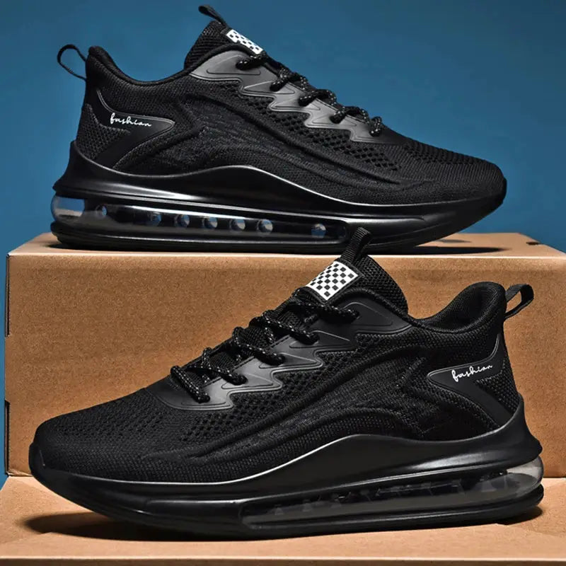 Pair of men's black athletic sneakers with breathable mesh upper and visible air-cushioned sole