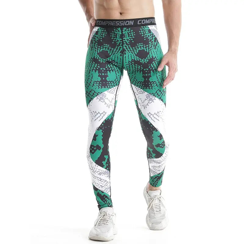Men's compression leggings in green and black snake camo with white panels and a black COMPRESSION waistband