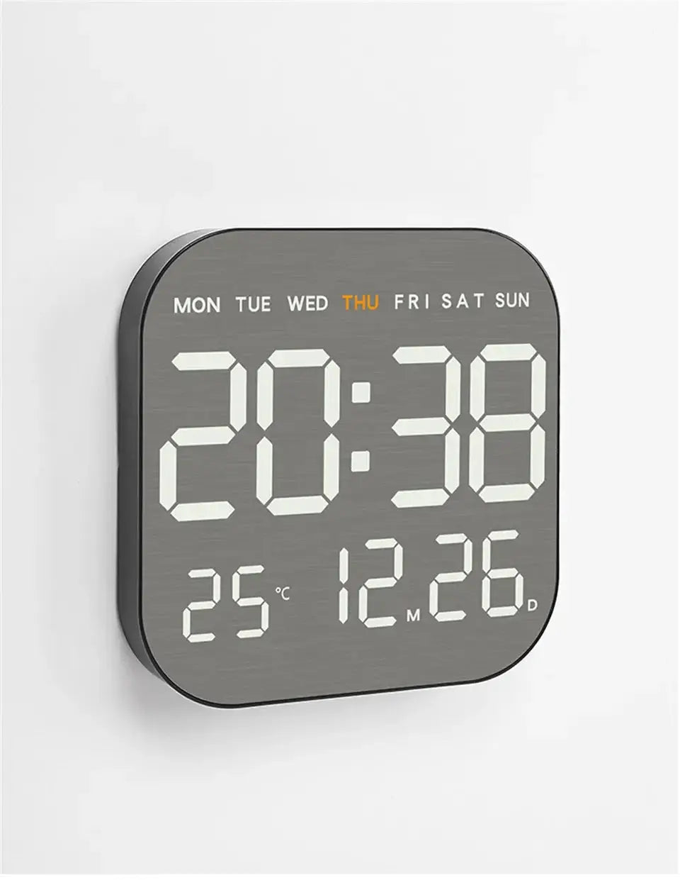 Mirror-brushed finish wall clock with rounded square design; large digital display shows time, day, date and temperature.