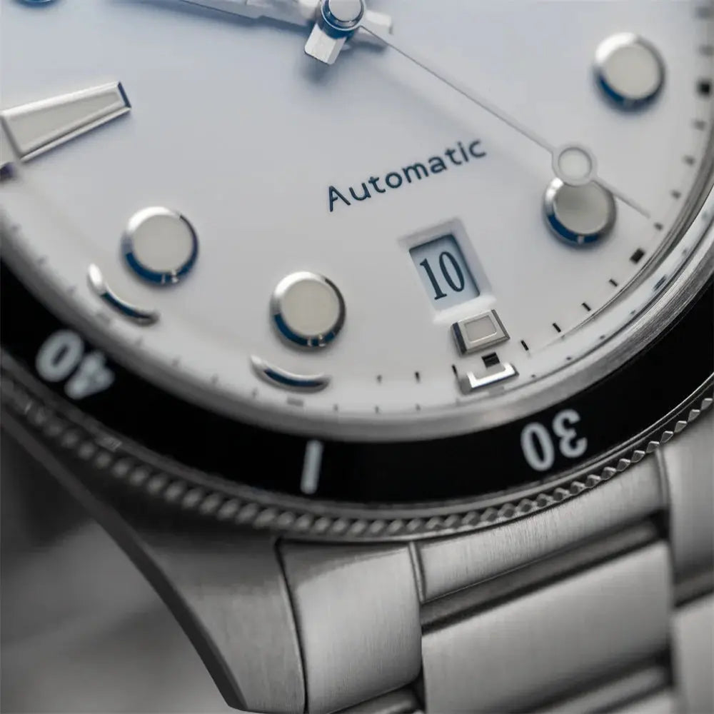 Simples Market Proxima PX1697 watch, white enamel dial, date display, stainless steel case and bracelet, automatic.