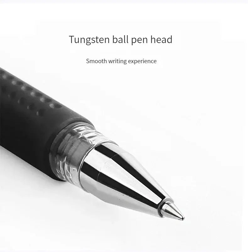 Ballpoint pen tip close-up with black textured grip and chrome nib