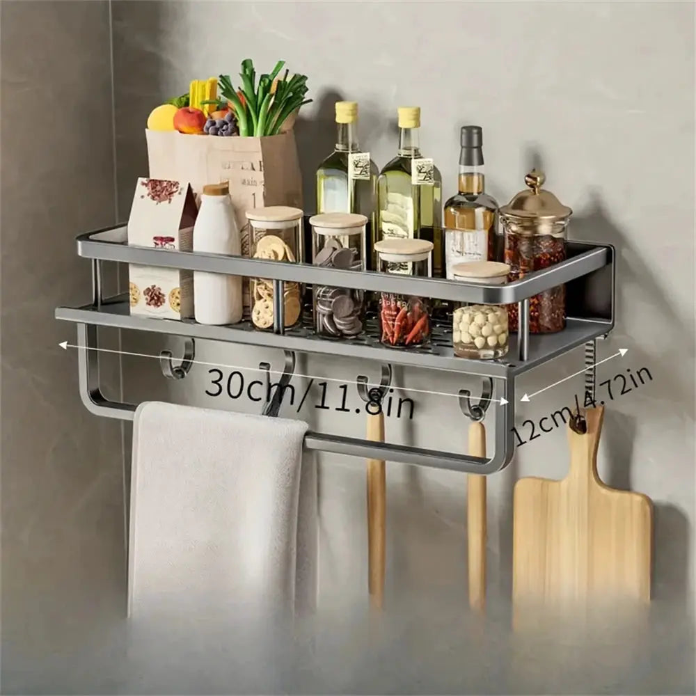 Wall-mounted gray metal storage rack with rod for spices, oils and jars; includes hooks and towel bar