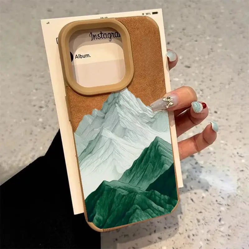 iPhone case with mountain lake scenery and tan faux leather trim