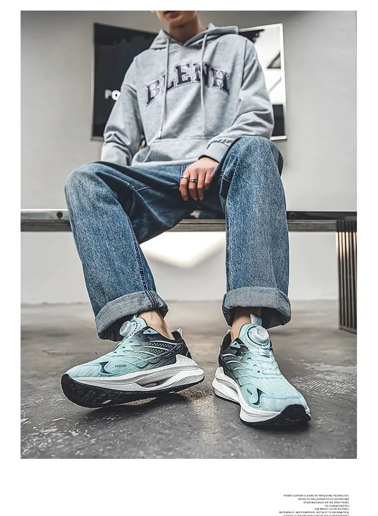 Men's breathable mesh running shoes in teal with rotating buckle lacing and white sole