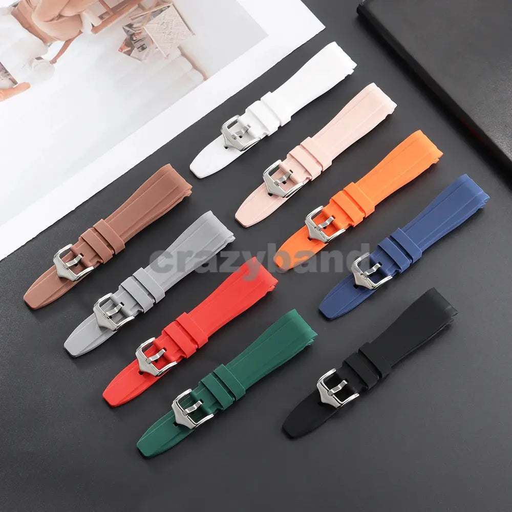 Assorted universal 20/22mm silicone watch bands with curved ends in multiple colors and stainless steel buckles