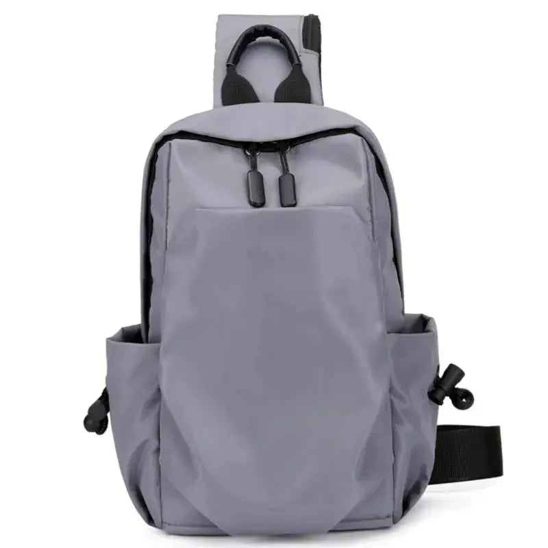 Simples Market men's large canvas crossbody backpack in gray with front pocket and side pockets.