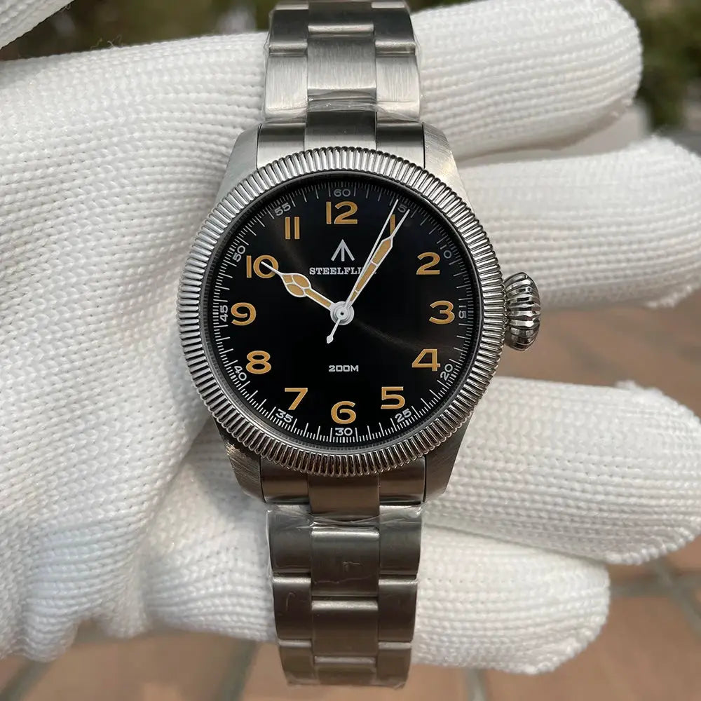 Steelflier stainless steel quartz wristwatch with black dial, gold numerals, and 200M water resistance