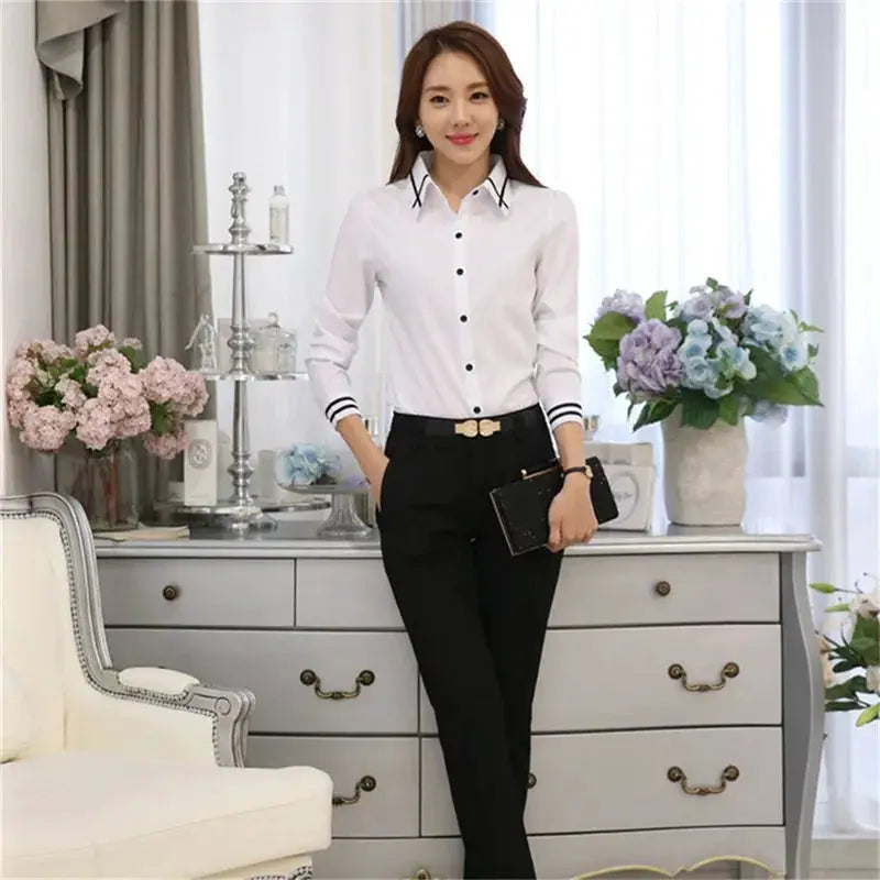 White long-sleeve women's shirt by Simples Market, classic office blouse.