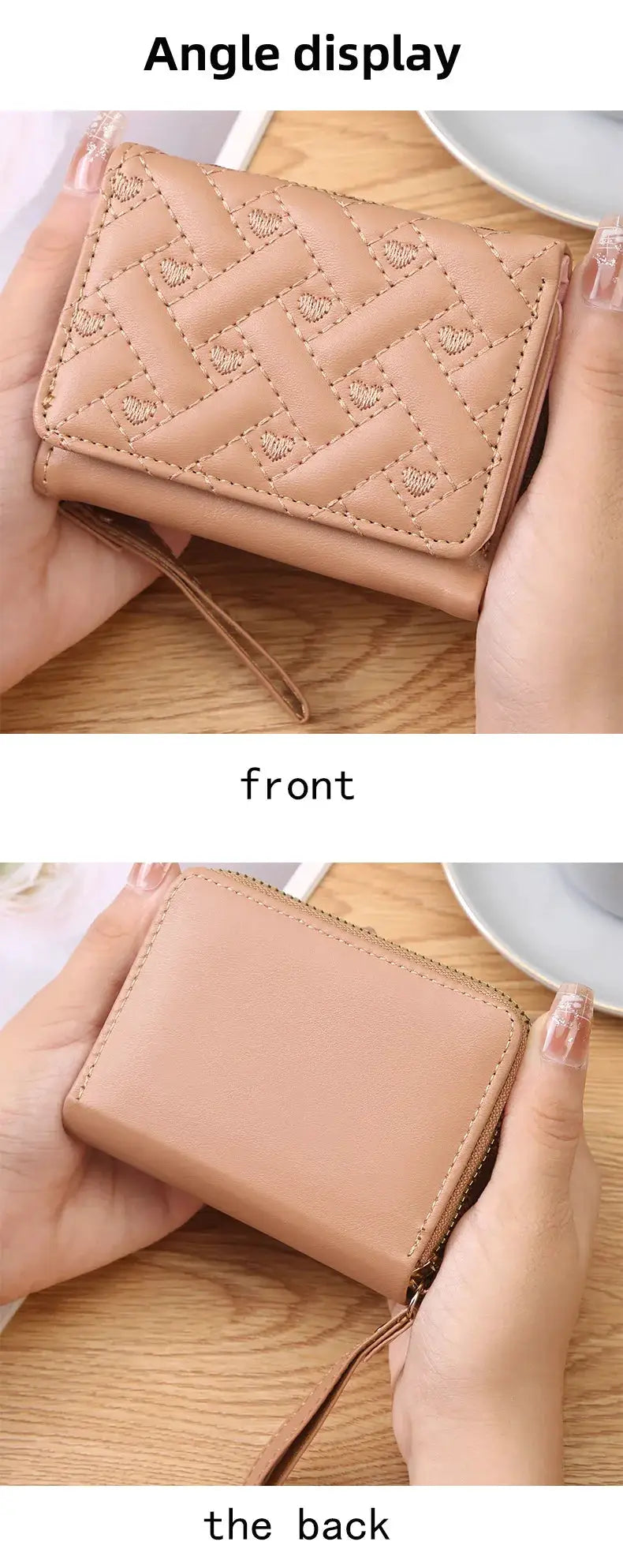 Women's pink faux leather wallet with quilted heart embroidery, zipper closure and wrist strap