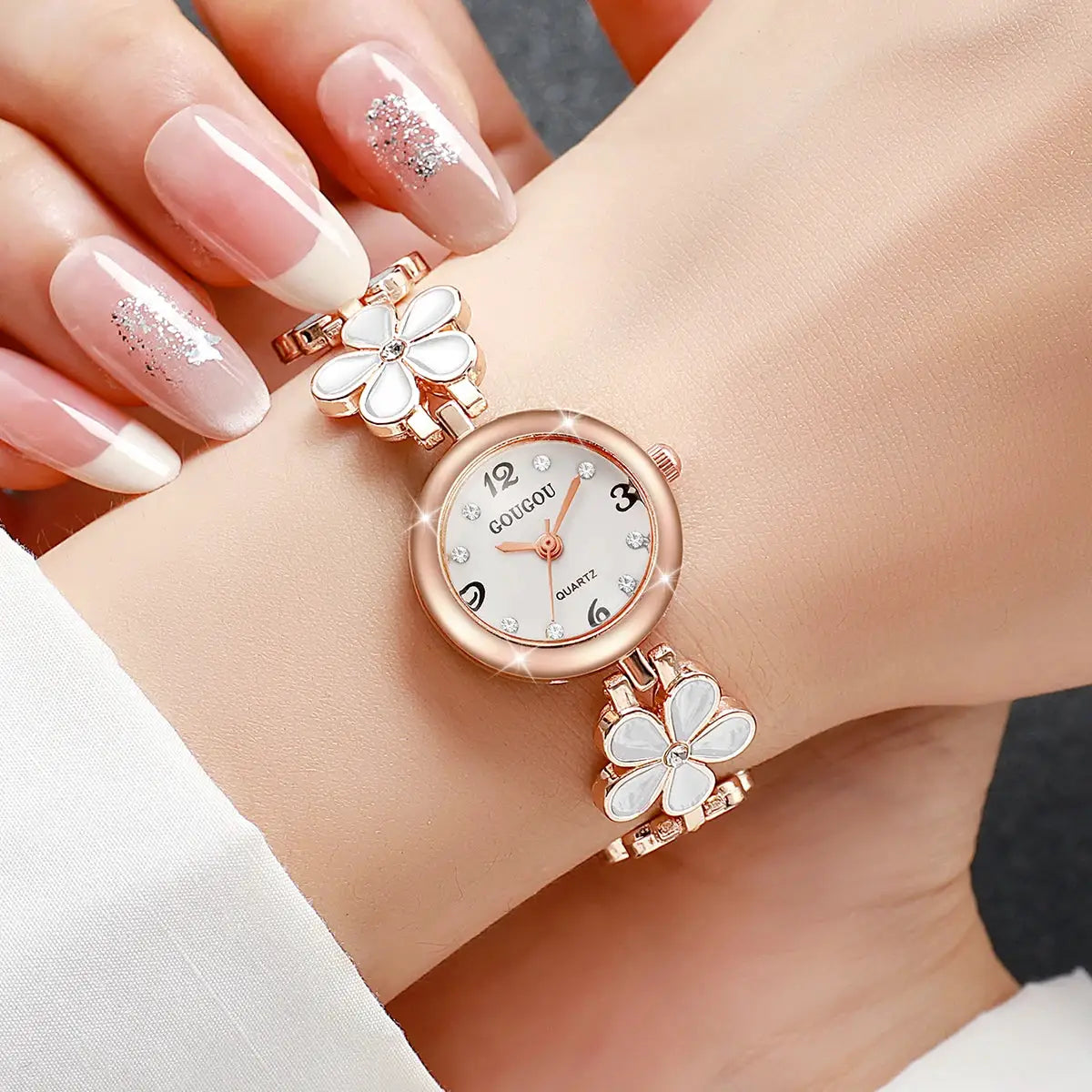 Women's rose-gold flower bracelet watch with arabic numeral dial and crystal accents by Simples Market