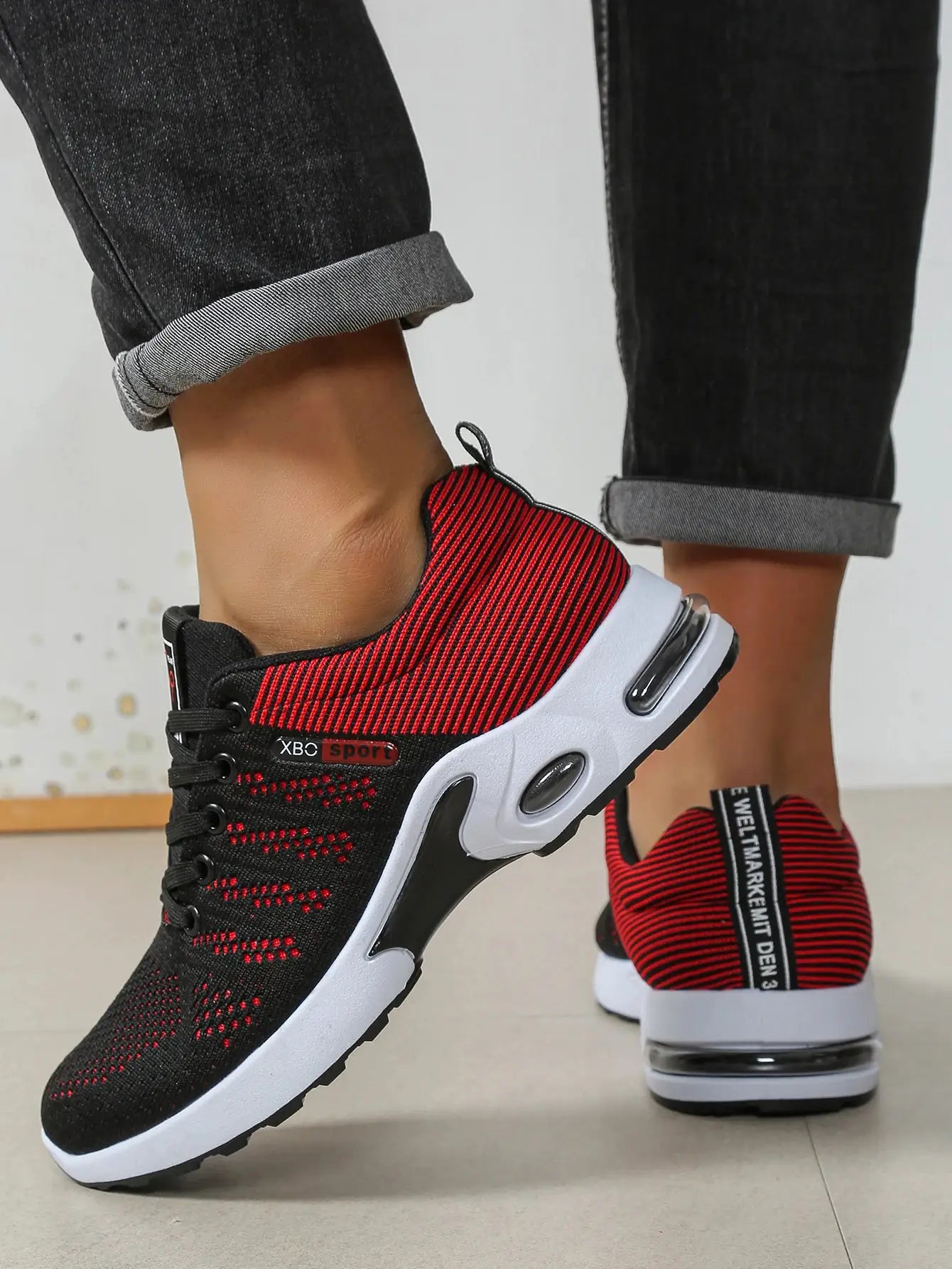 Simples Market XBO Sport men's breathable lace-up running shoes with black/red knit upper and cushioned white sole.