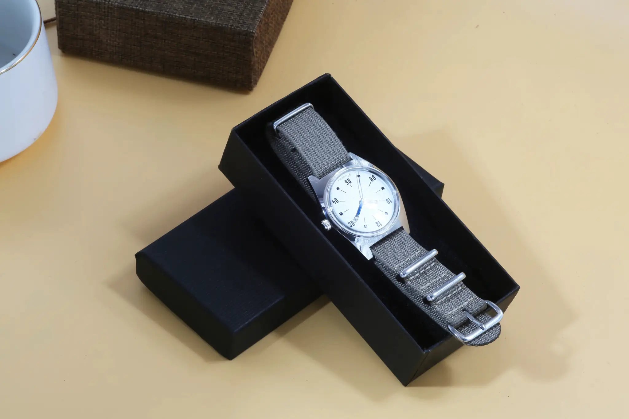 7120 Hand-Wind Mechanical Watch for Men, 36mm, grey fabric strap, silver dial in a black presentation box