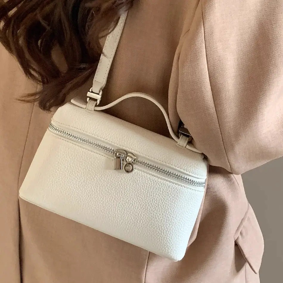 White lychee-grain mini shoulder bag with top handle and dual-zip closure