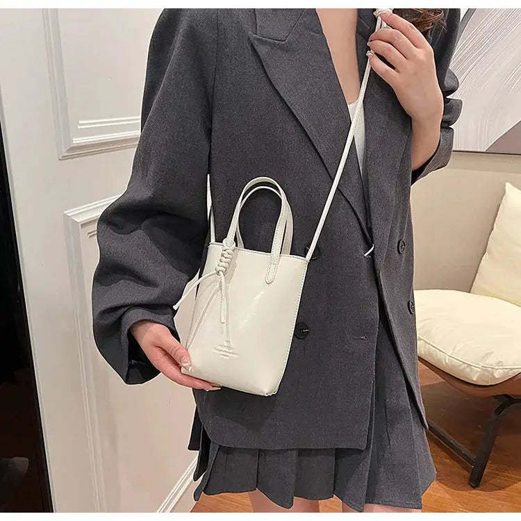 PU Leather Mini Crossbody Bag for Women by Simples Market, white with top handles and adjustable shoulder strap