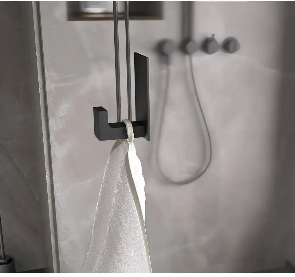 Simples Market black self-sticking bathroom hardware set with robe hook, towel bar, and paper holder.