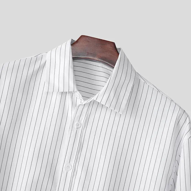 Men's white striped dress shirt with thin vertical stripes, button-down collar and long sleeves on a hanger