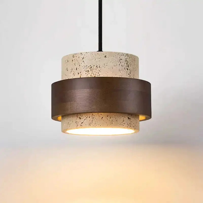 Pendant lamp by Simples Market; speckled beige ceramic with a dark brown band, warm light
