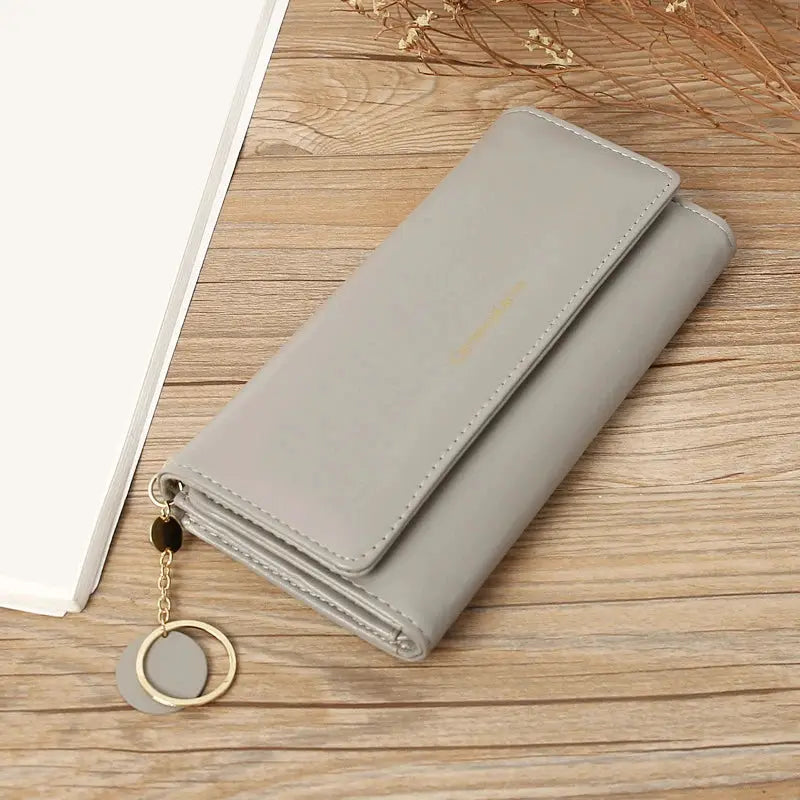 PU leather long wallet by Simples Market, light gray fold purse with gold keychain accent