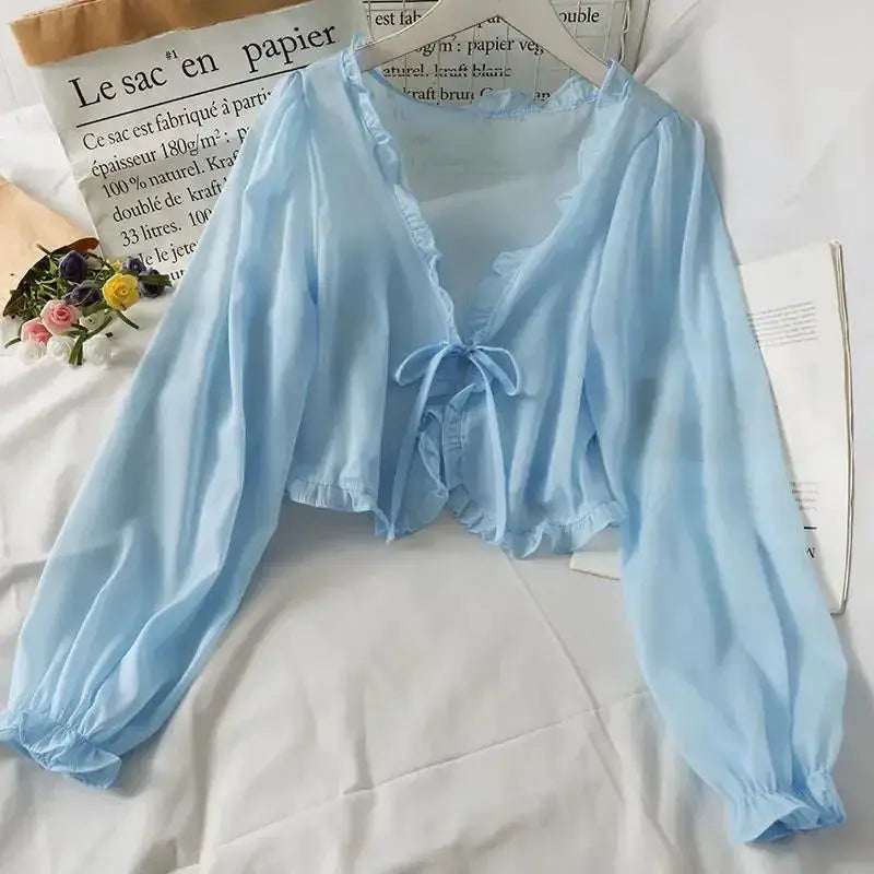 Light-blue long-sleeve breathable cardigan blouse with bow tie and ruffle trim by Simples Market