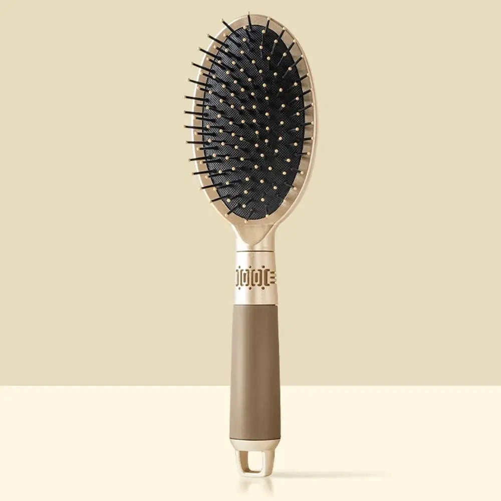 CALIYI hair massage air-cushion oval brush by Simples Market; beige handle with black cushion bristles