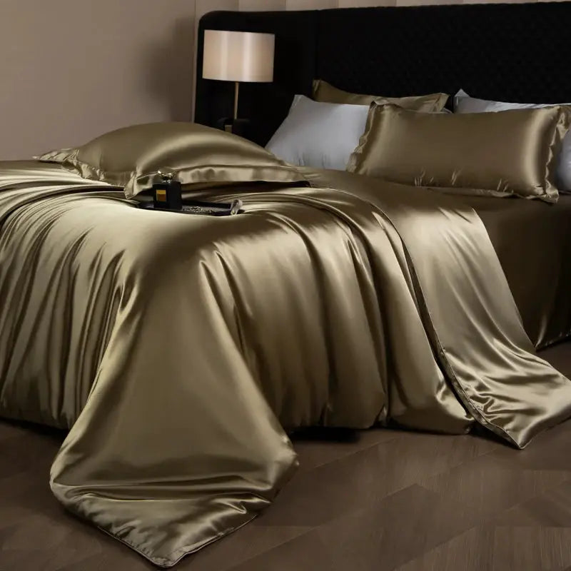 Silk bed sheets set by Simples Market in champagne gold with duvet cover, fitted and flat sheets, pillowcases