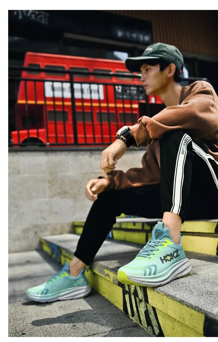 Men's running shoes in turquoise breathable mesh with lime-green accents and a chunky white sole