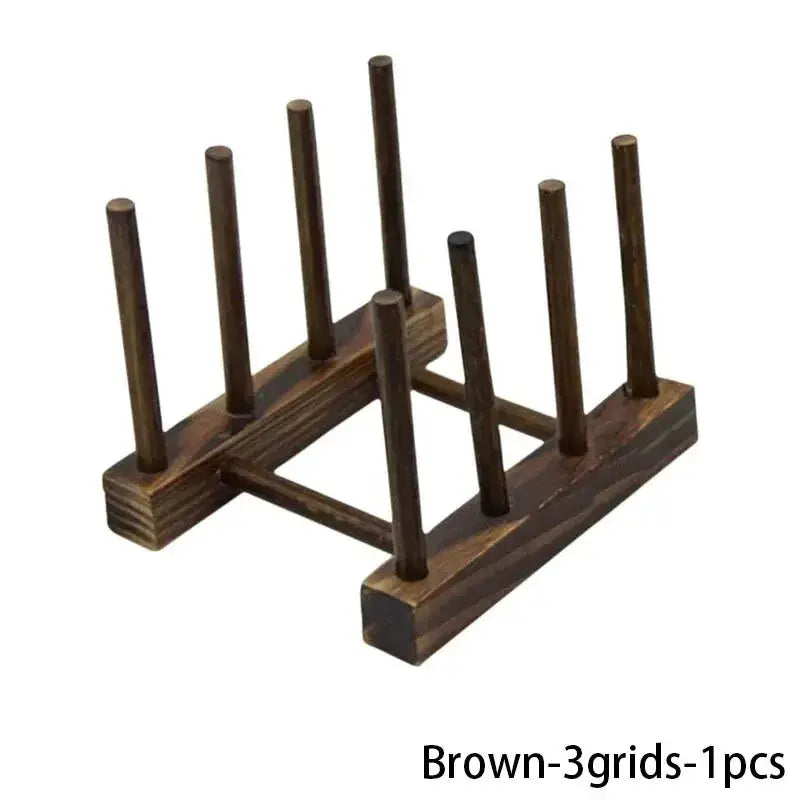 Wooden dish drying rack with vertical peg holders in brown finish for kitchen organization.
