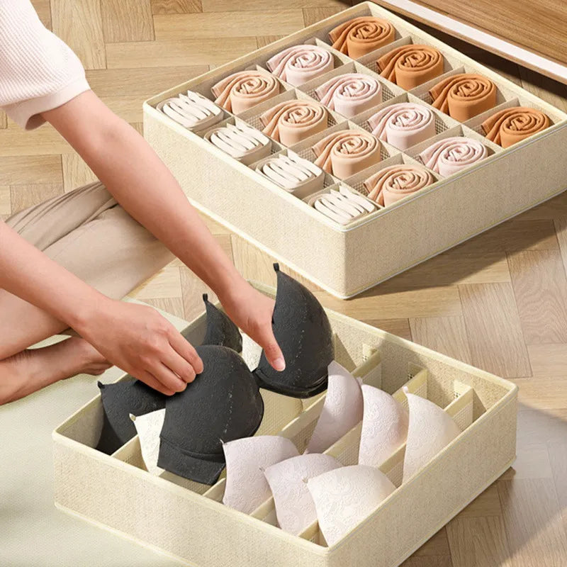 Simples Market beige fabric underwear organizer storage box with dividers for bras and rolled socks.