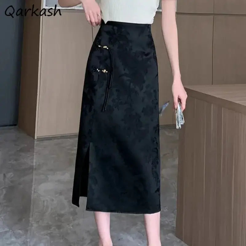 Simples Market Chinese-style black floral midi skirt, high-waisted with a side slit and decorative beaded tie.