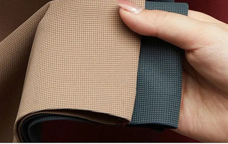 Men's polo shirt fabric swatches in beige and blue held by hand