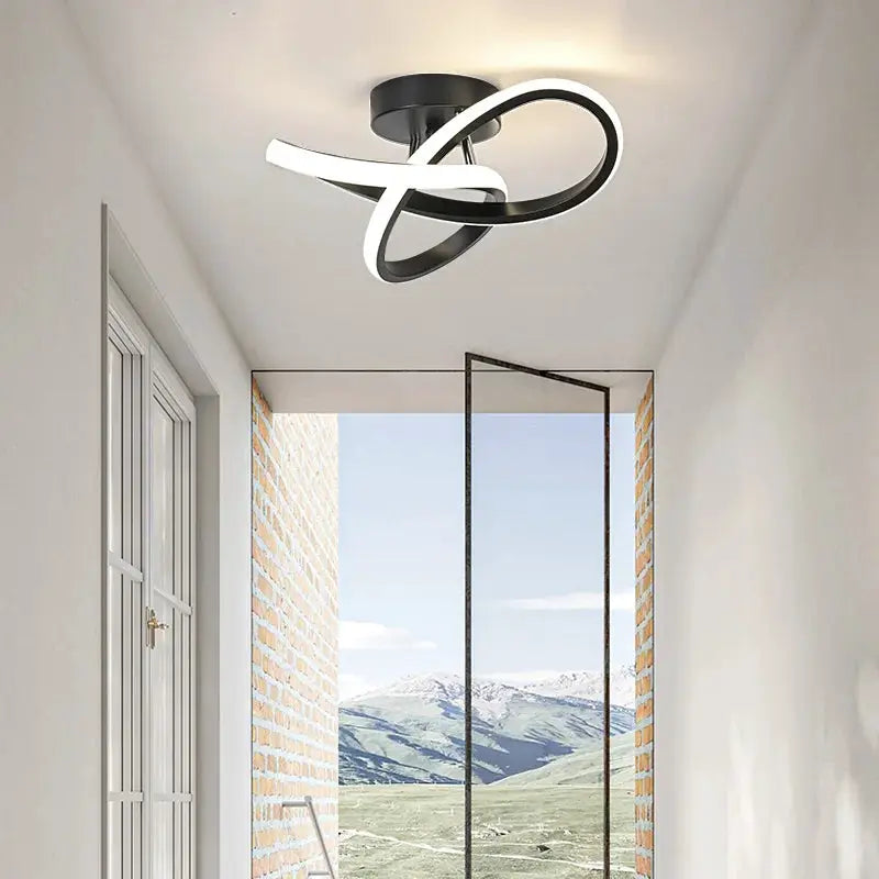 Modern LED ceiling light fixture with black and white intertwined rings, surface-mounted for hallway.