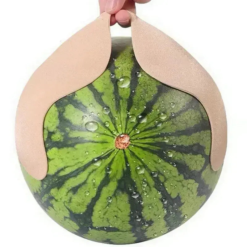Invisible strapless adhesive stick bra by Simples Market; nude silicone cups atop a round watermelon