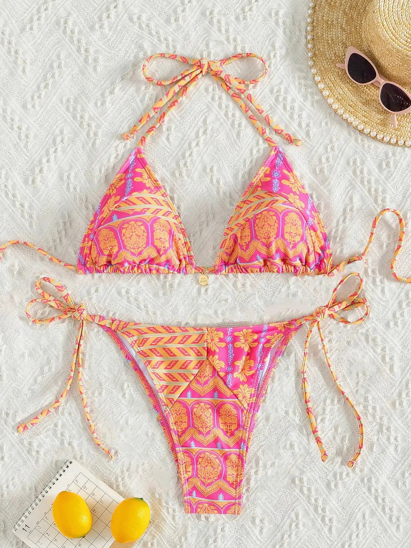 Bikini set, pink and orange tropical print two-piece with adjustable tie sides