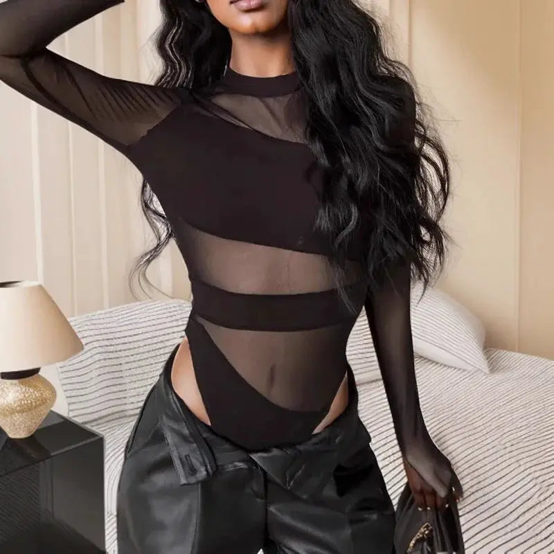 Jumpsuit with black mesh panels and diagonal cutouts, long sleeves, clubwear