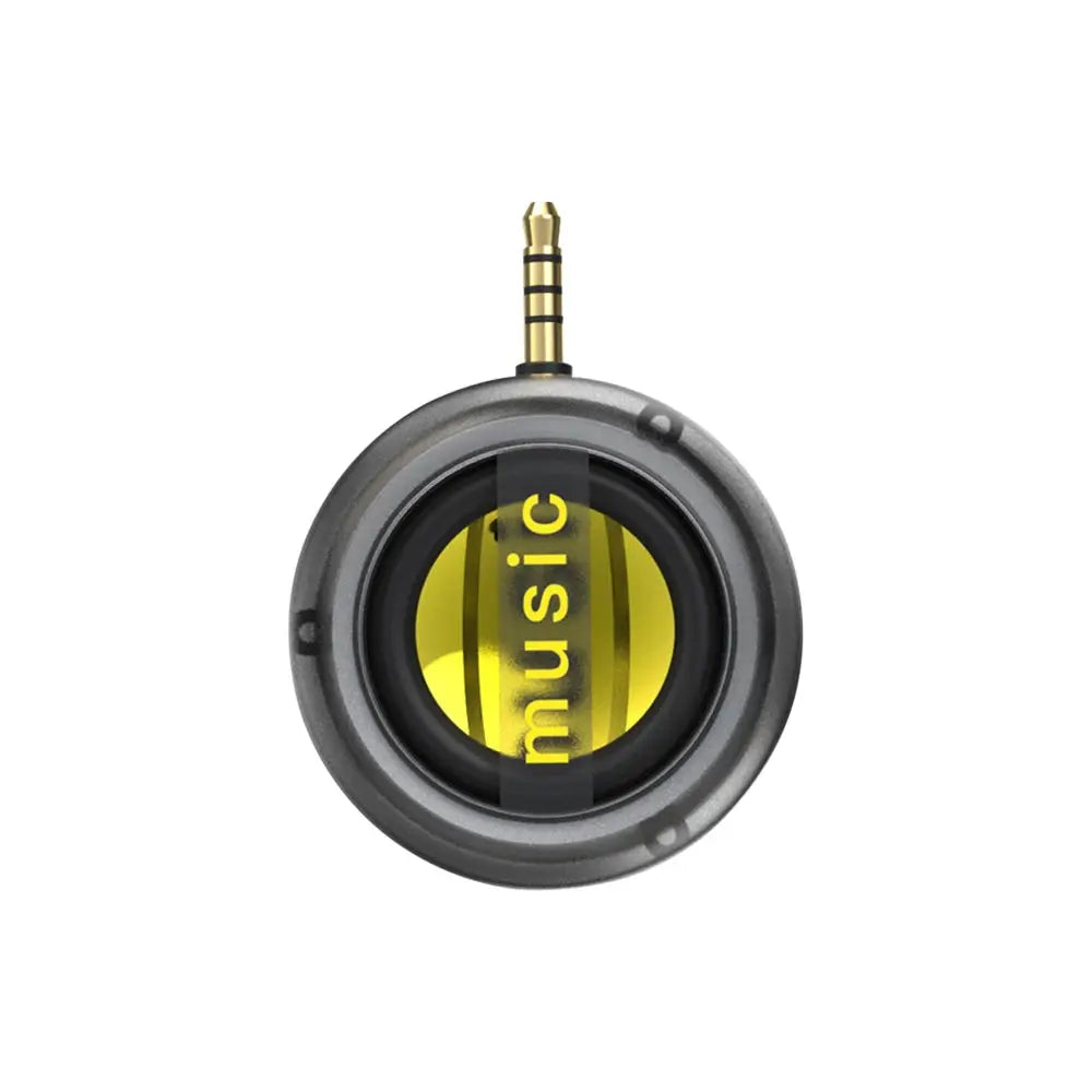 Music speaker, round gray portable with yellow center and 3.5mm inline jack