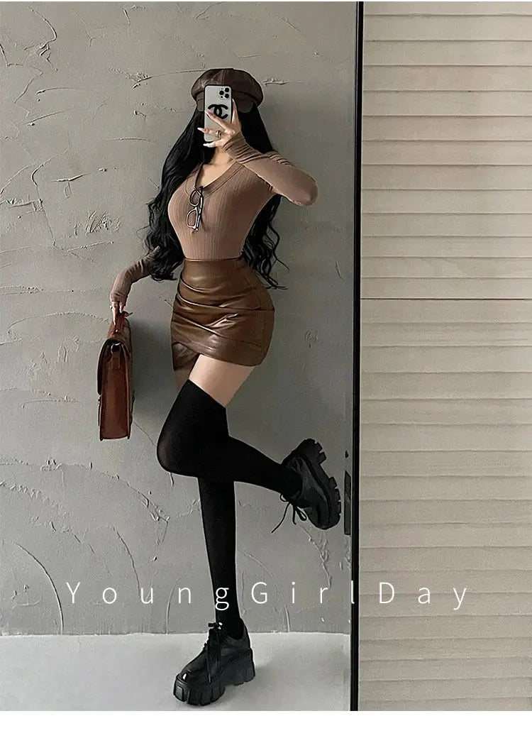 Brown PU leather high-waist A-line mini skirt with wrinkle-wrapped hip design