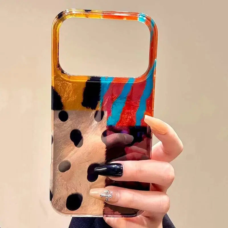 Phone case with leopard pattern in metallic gold and black spots plus bright multicolor stripes for iPhone