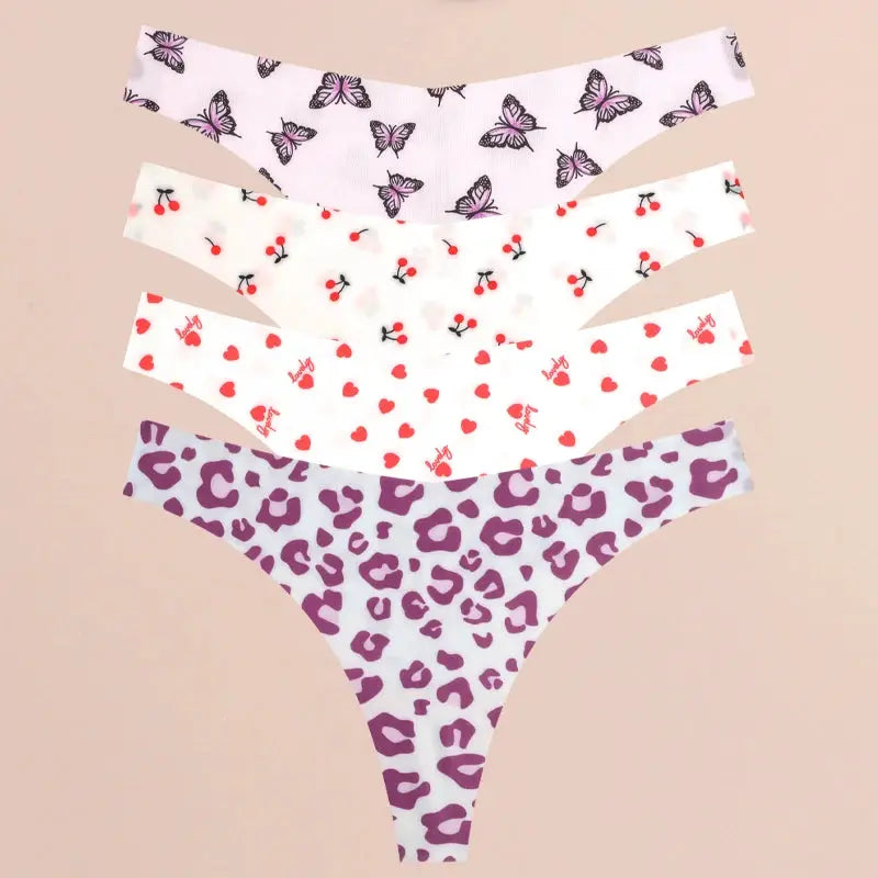 Womens thong underwear set with 4 pairs featuring butterfly, cherry, heart, and leopard prints