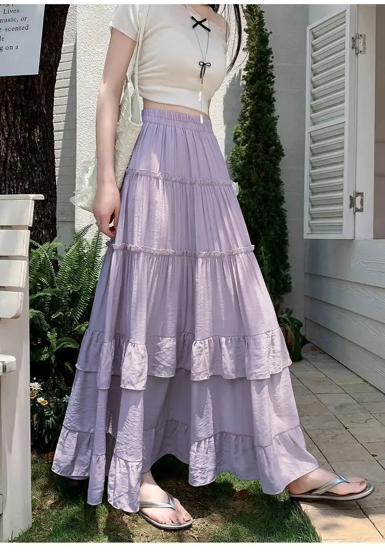 Tiered ruffle-hem lavender maxi skirt with high-waist, flowing layered design