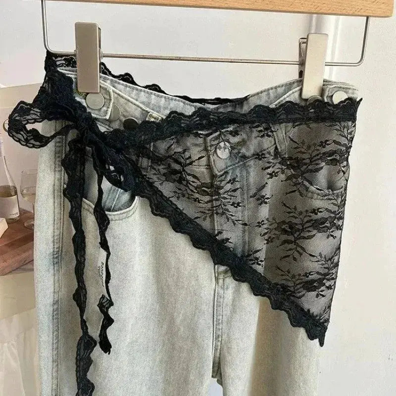 Women's denim mini skirt with black lace overlay and wrap belt