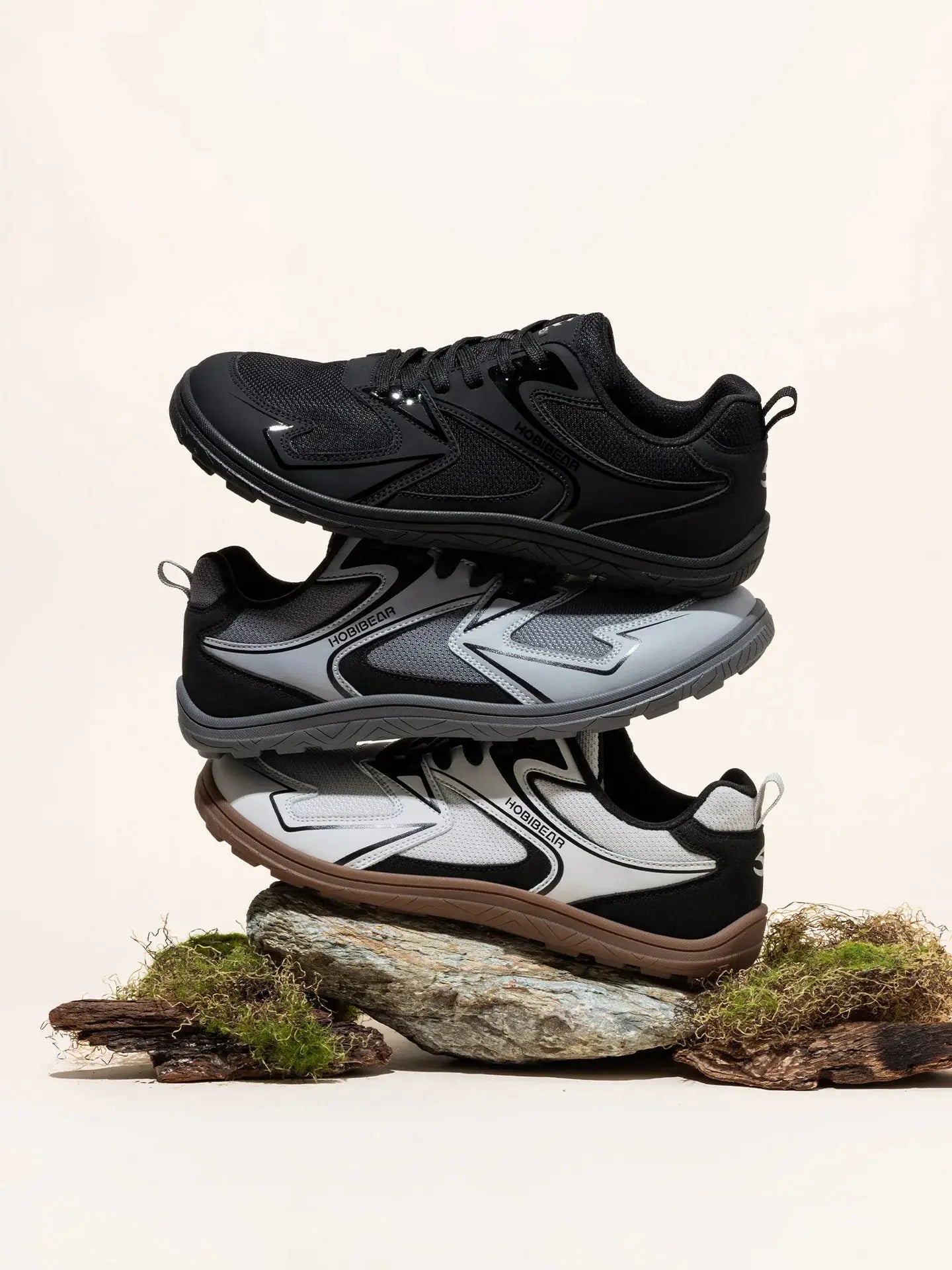 HOBIBEAR barefoot minimalist sneakers; unisex wide-width, black gray white colorways stacked on rocks