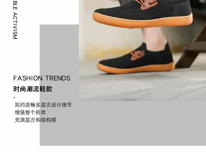 Barefoot minimalist shoes by Simples Market, black knit upper with orange sole, unisex wide version